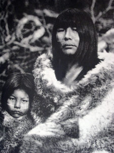 Selknam woman and her child, with facial paint